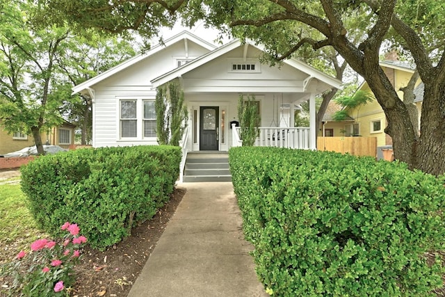 bungalow-style home with a porch