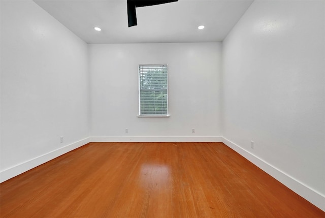 empty room featuring hardwood / wood-style flooring