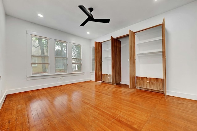 unfurnished bedroom with wood-type flooring and ceiling fan