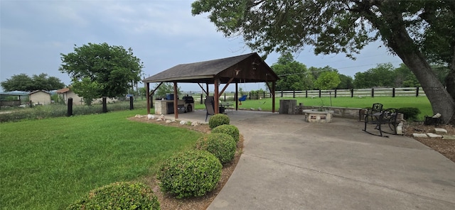 view of home's community featuring a gazebo, a yard, and a patio