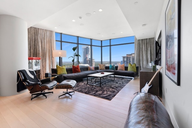 living room featuring hardwood / wood-style floors and expansive windows