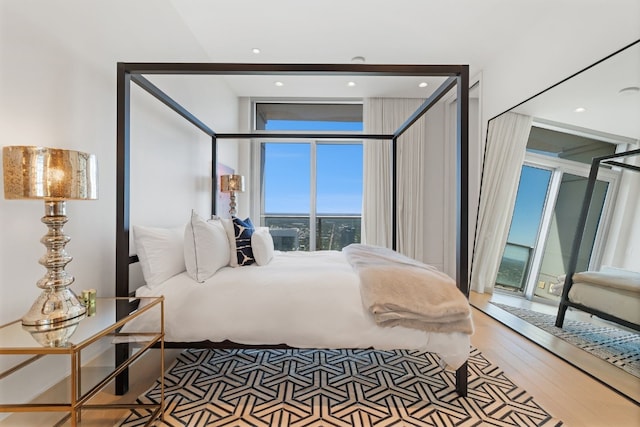 bedroom featuring wood-type flooring