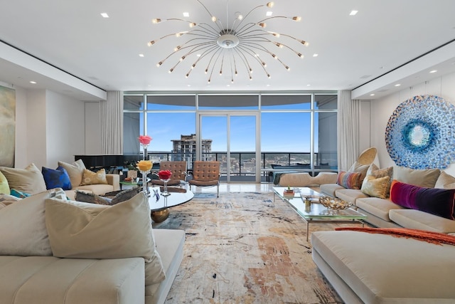 living room with a notable chandelier and expansive windows