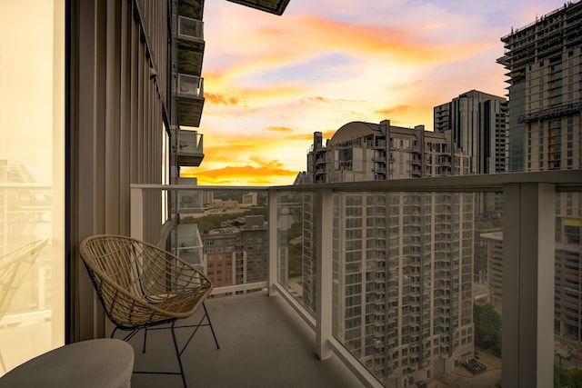 view of balcony at dusk