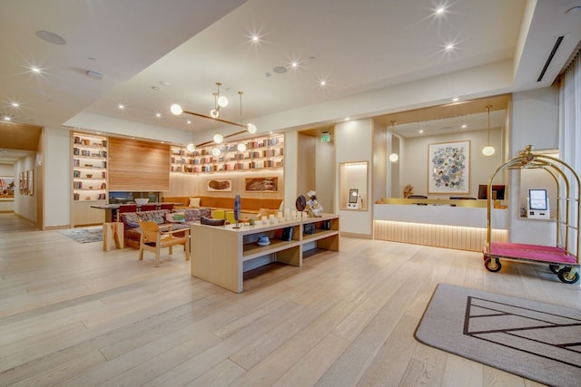 kitchen featuring hanging light fixtures and light hardwood / wood-style floors