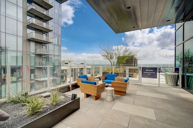 balcony with an outdoor hangout area