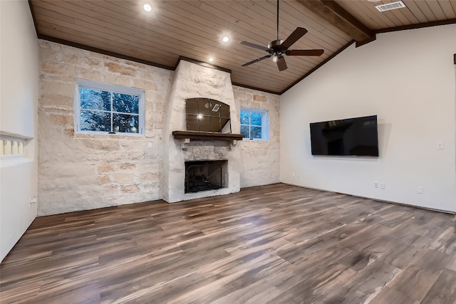 unfurnished living room with ceiling fan, beamed ceiling, dark hardwood / wood-style floors, wooden ceiling, and a fireplace