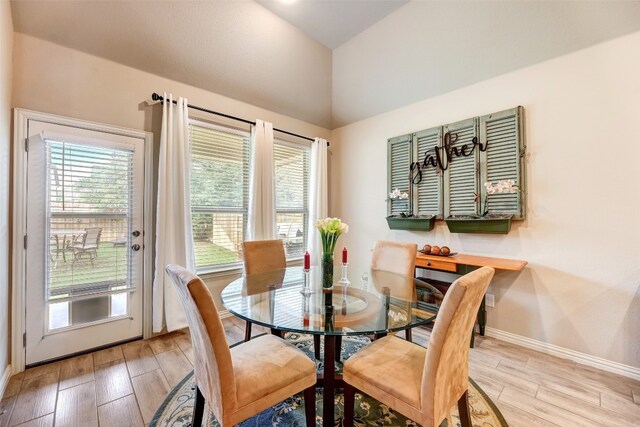 dining area with light hardwood / wood-style flooring