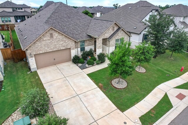 french provincial home with a front lawn