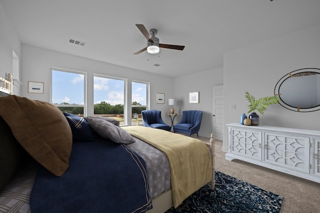 bedroom with light carpet and ceiling fan