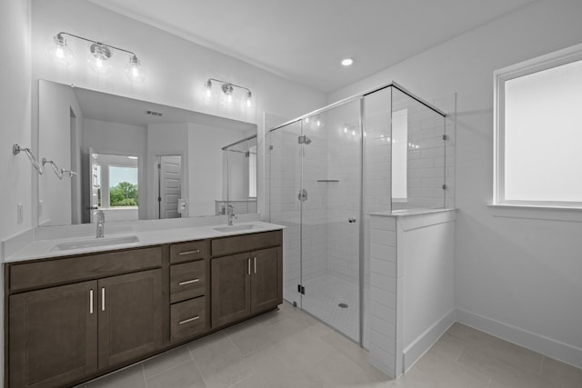 bathroom with walk in shower and vanity