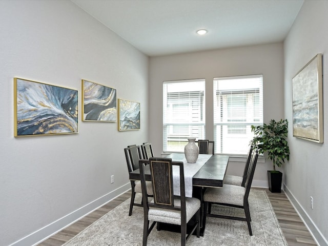 dining space featuring light hardwood / wood-style flooring