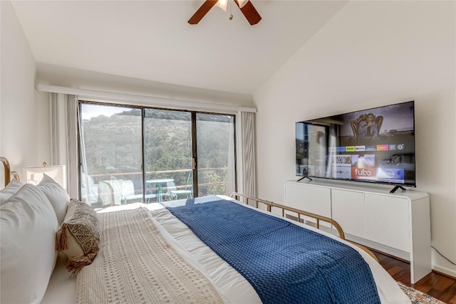 bedroom with dark wood finished floors, access to outside, vaulted ceiling, and ceiling fan