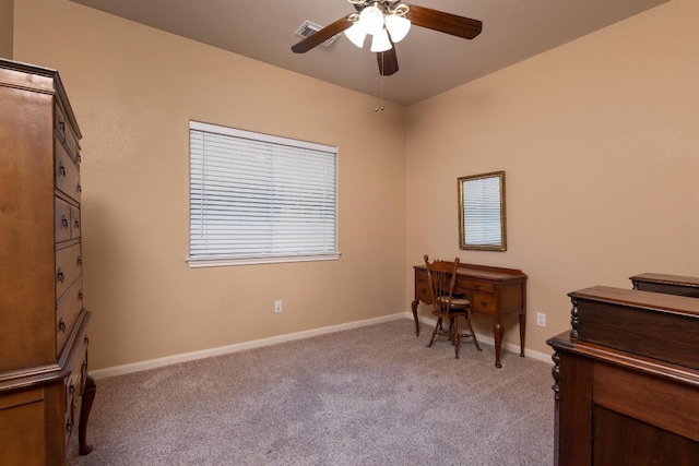 office with ceiling fan and light colored carpet