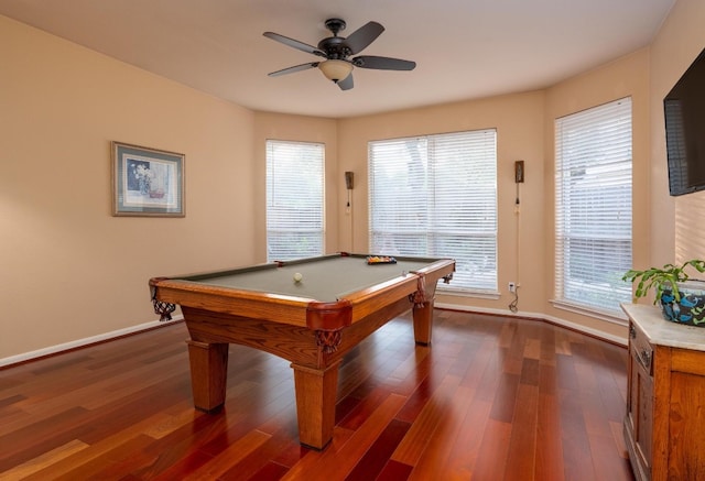 game room with dark hardwood / wood-style flooring, ceiling fan, a healthy amount of sunlight, and pool table