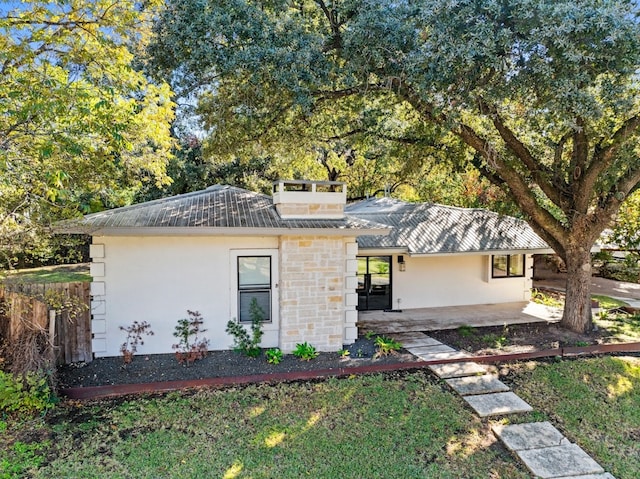 view of front of home with a patio