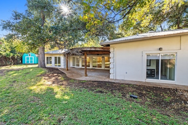 view of yard featuring a patio area and a storage unit