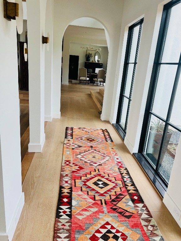 hallway with light wood-type flooring