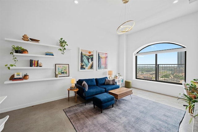 living room featuring an inviting chandelier