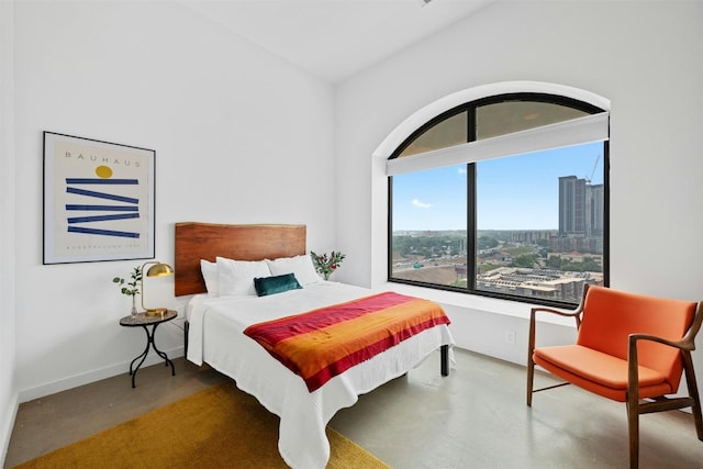 bedroom with concrete floors