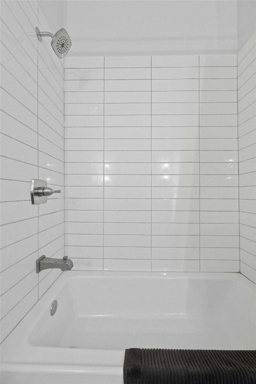 bathroom with shower / bathing tub combination