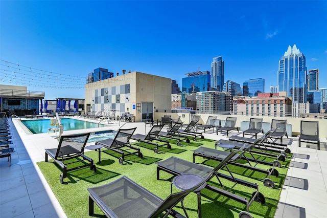 view of swimming pool with a patio area