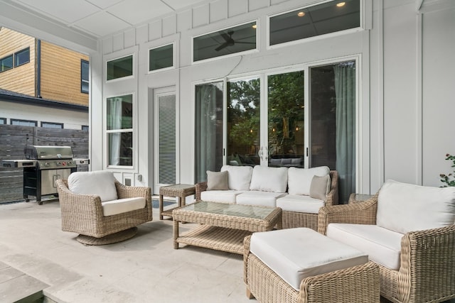 view of patio with area for grilling and outdoor lounge area