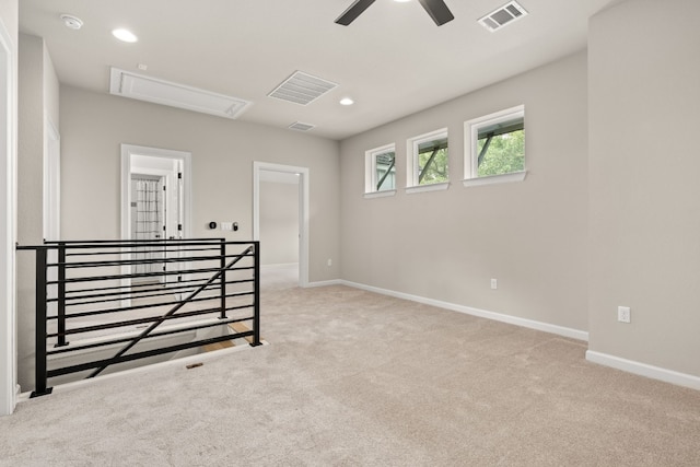 bedroom with ceiling fan and light colored carpet