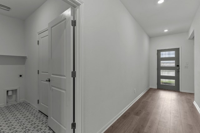 foyer with light hardwood / wood-style floors