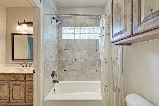 full bathroom with toilet, vanity, and shower / tub combo with curtain