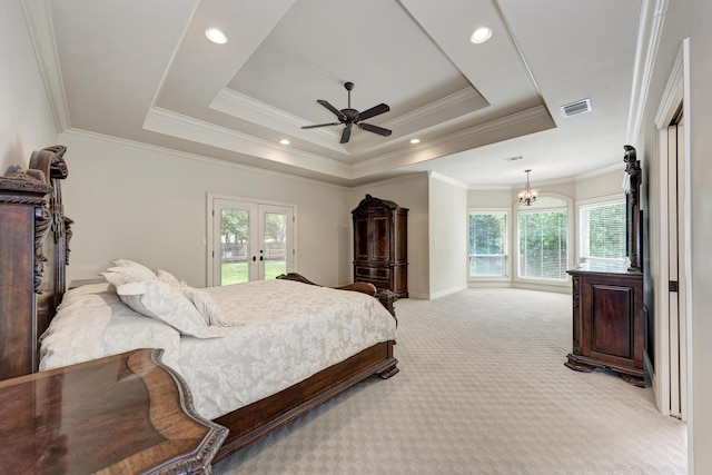 bedroom featuring a raised ceiling, access to outside, light colored carpet, crown molding, and ceiling fan with notable chandelier