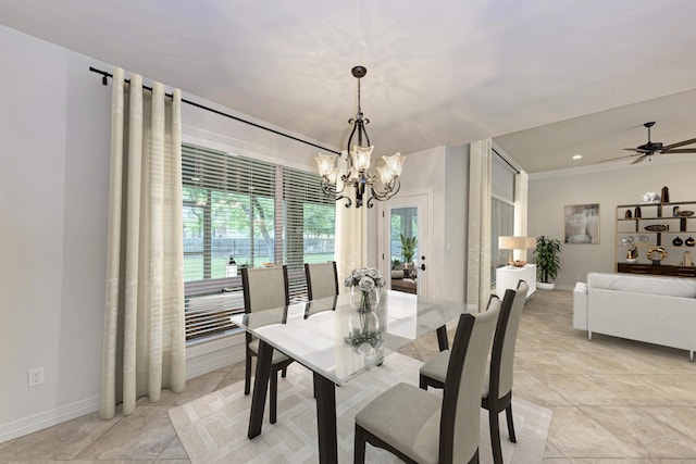 dining room with ceiling fan with notable chandelier