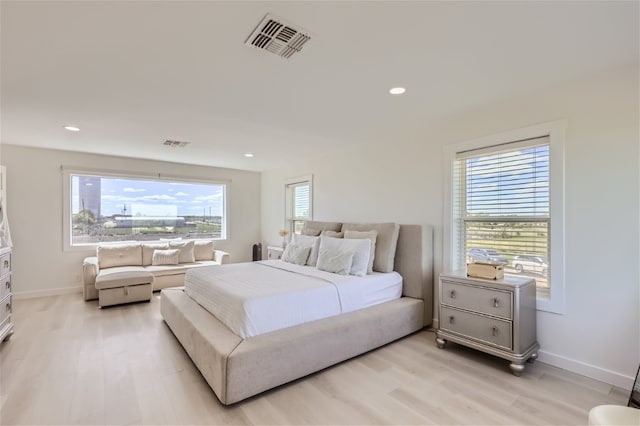 bedroom featuring light hardwood / wood-style flooring