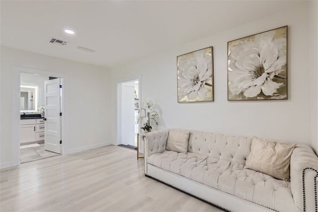 living room featuring light wood-type flooring