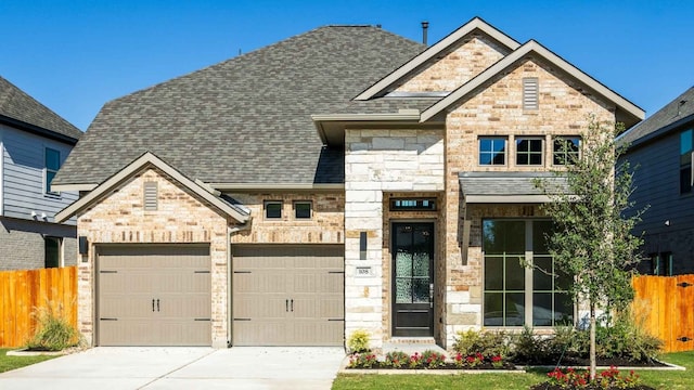 view of front of property featuring a garage