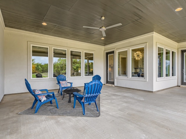 view of patio / terrace featuring ceiling fan