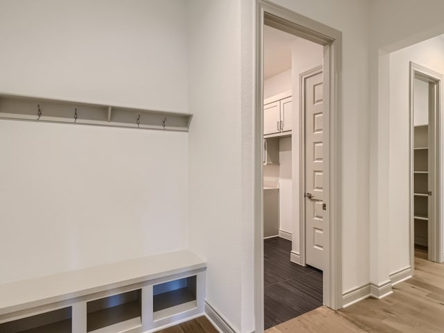 mudroom with hardwood / wood-style flooring