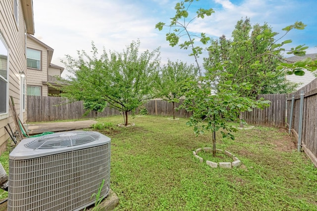 view of yard featuring central AC unit