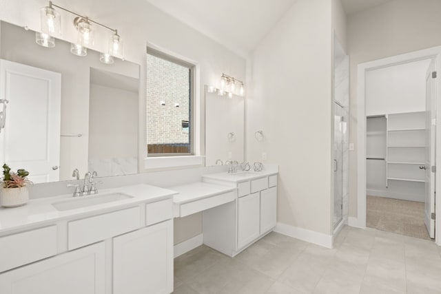 bathroom featuring vanity, tile patterned floors, and an enclosed shower