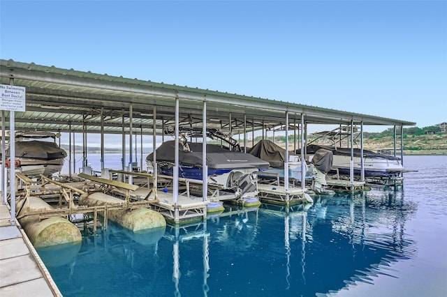 dock area featuring a water view