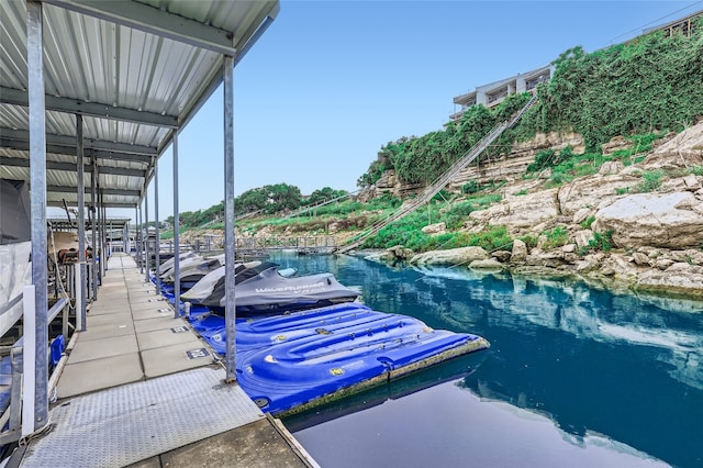 view of dock with a water view