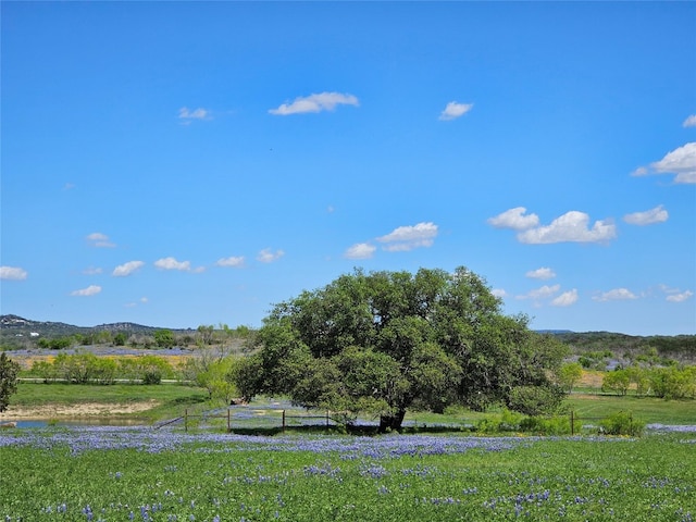 view of mountain feature with a rural view