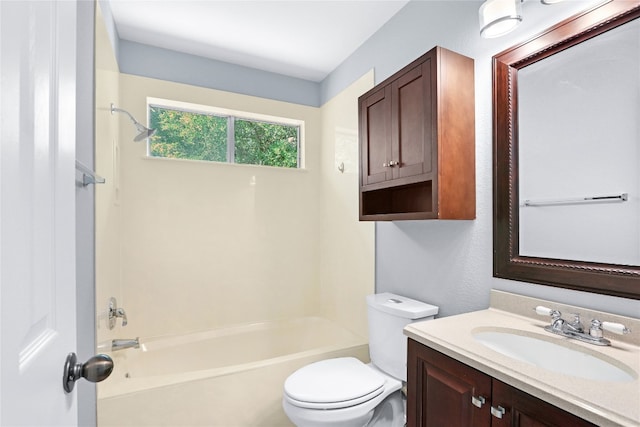 full bathroom with vanity, toilet, and  shower combination