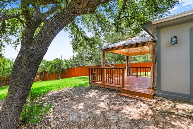 exterior space with a lawn and a gazebo