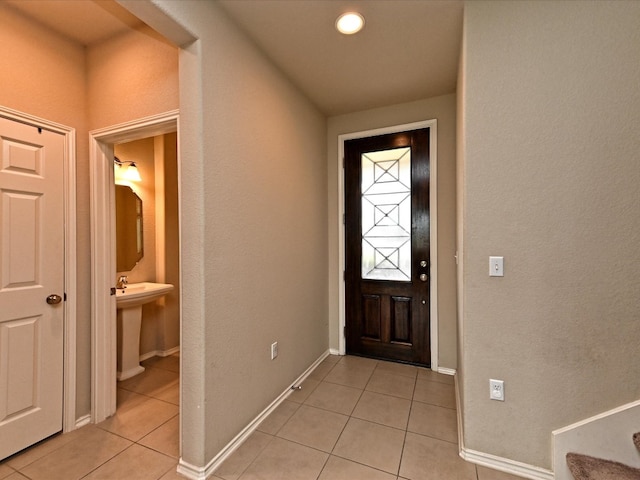 view of tiled foyer entrance