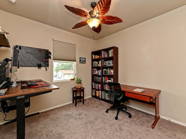 office space featuring carpet and ceiling fan