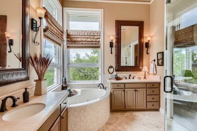 bathroom with tile flooring, oversized vanity, double sink, a bathing tub, and ornamental molding