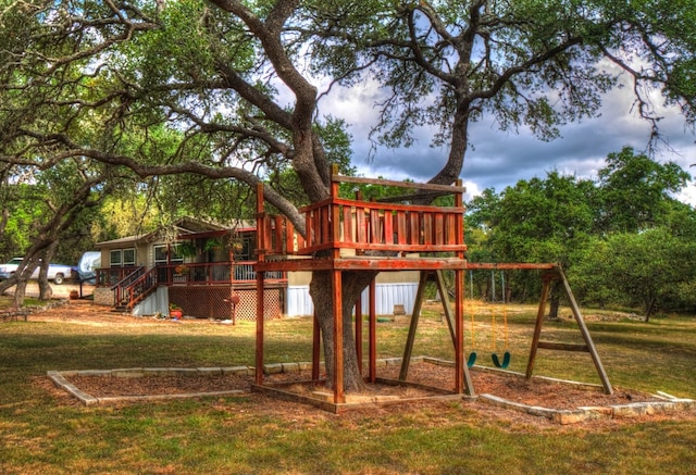 view of jungle gym featuring a yard