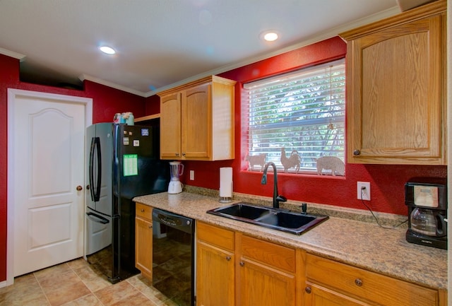 kitchen featuring crown molding, sink, and black appliances