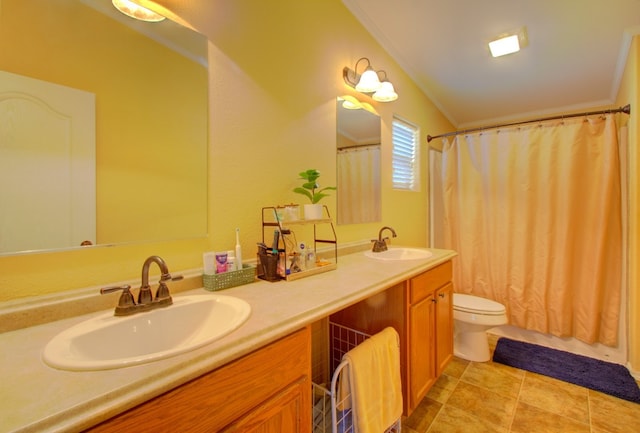 bathroom with vanity, lofted ceiling, toilet, curtained shower, and tile patterned flooring